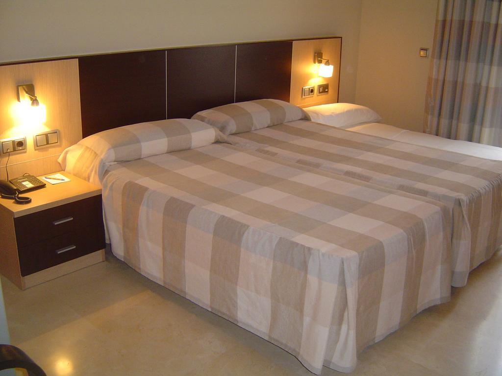 Hotel Flamingo L'Ampolla Pokoj fotografie